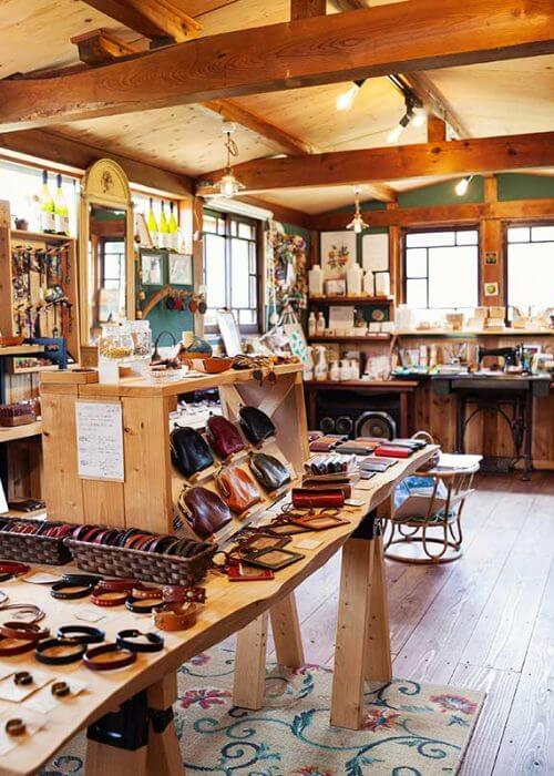 interior view of a leather shop selling belts brac